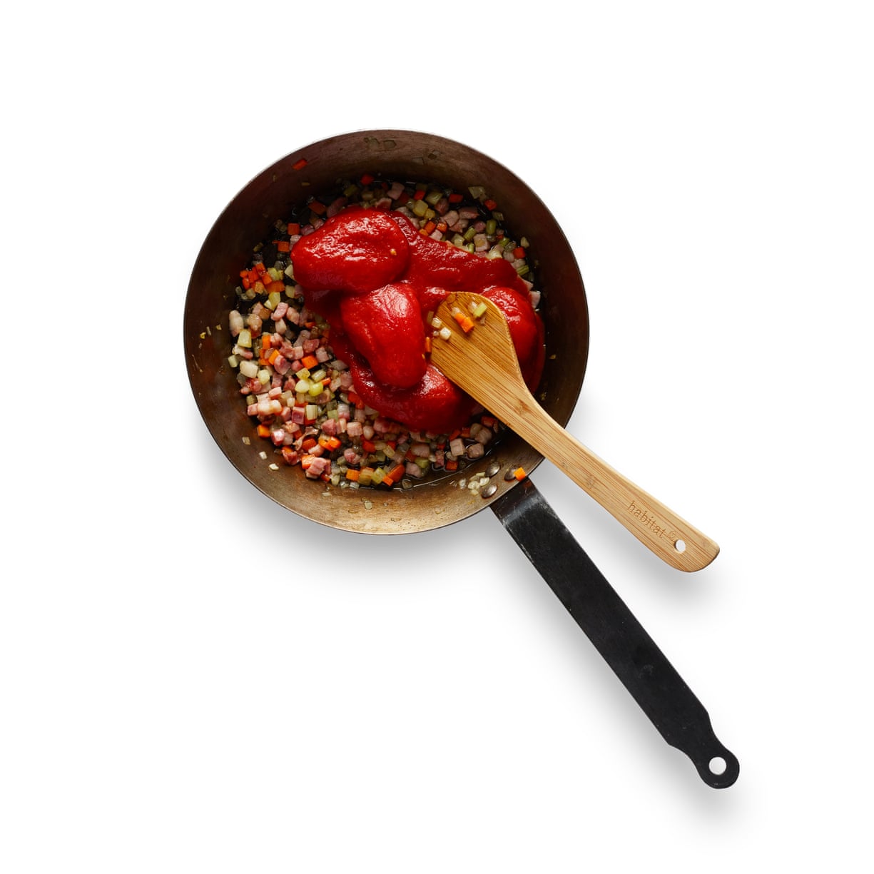 Stir in the tomatoes – break them up with a wooden spoon.